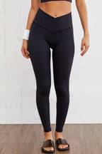 Black arched waist seamless active leggings for women with tummy control and high elasticity fabric.