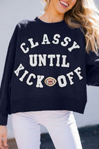 Navy blue oversized sweatshirt with plush "Classy Until Kickoff" lettering and football patch, cozy casual fit for fall and winter.