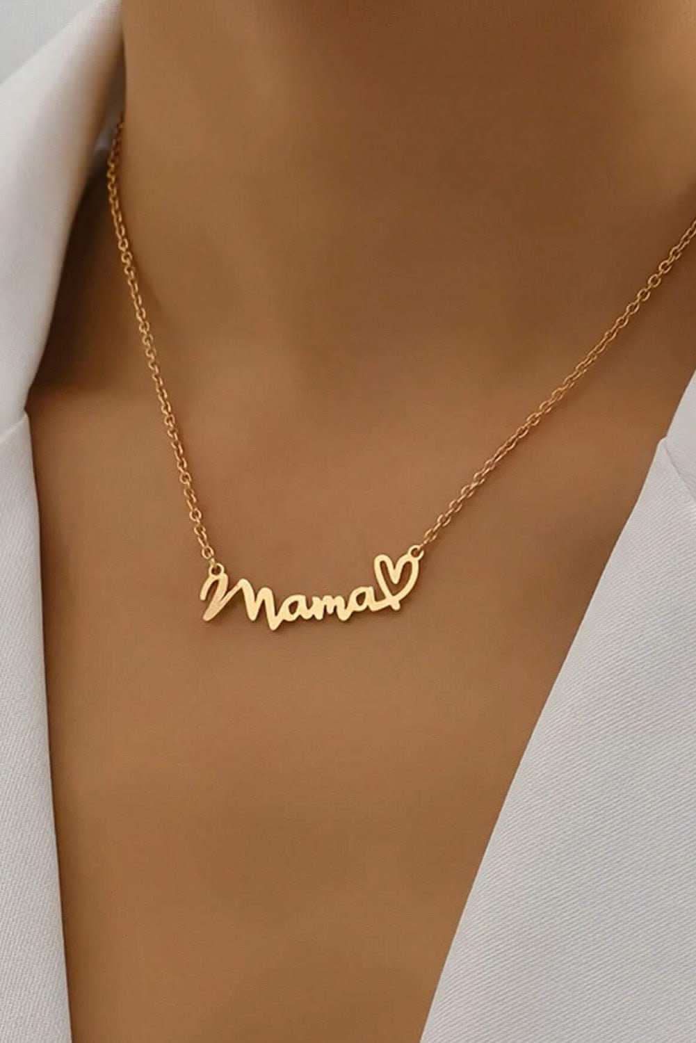 Gold mama pendant necklace with heart design on a delicate gold chain