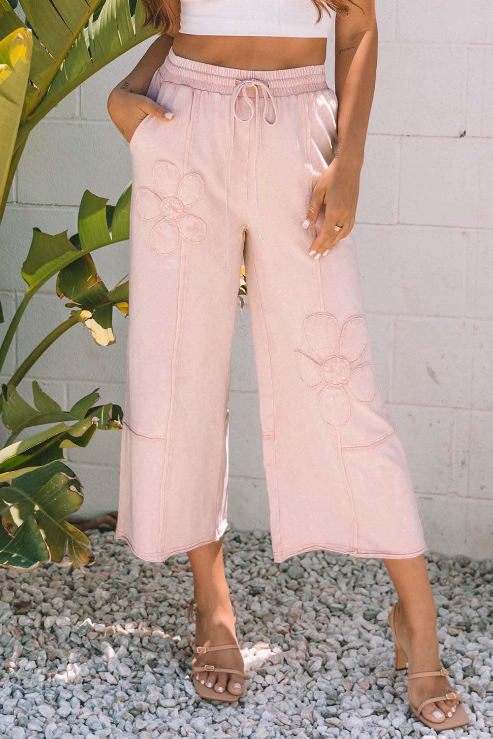Pink flower patch cropped wide leg terry knit pants with mineral washed finish