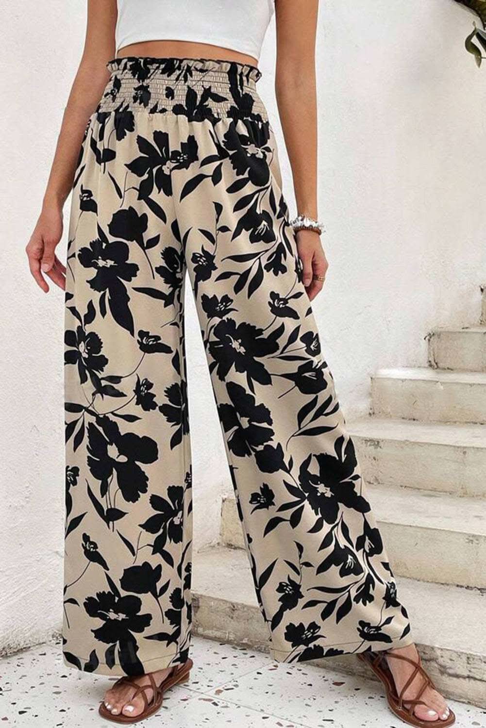 Khaki floral print smocked high waist wide leg pants with black flower design and boho style