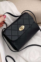 Black PU leather diamond pattern messenger bag with gold clasp and adjustable strap