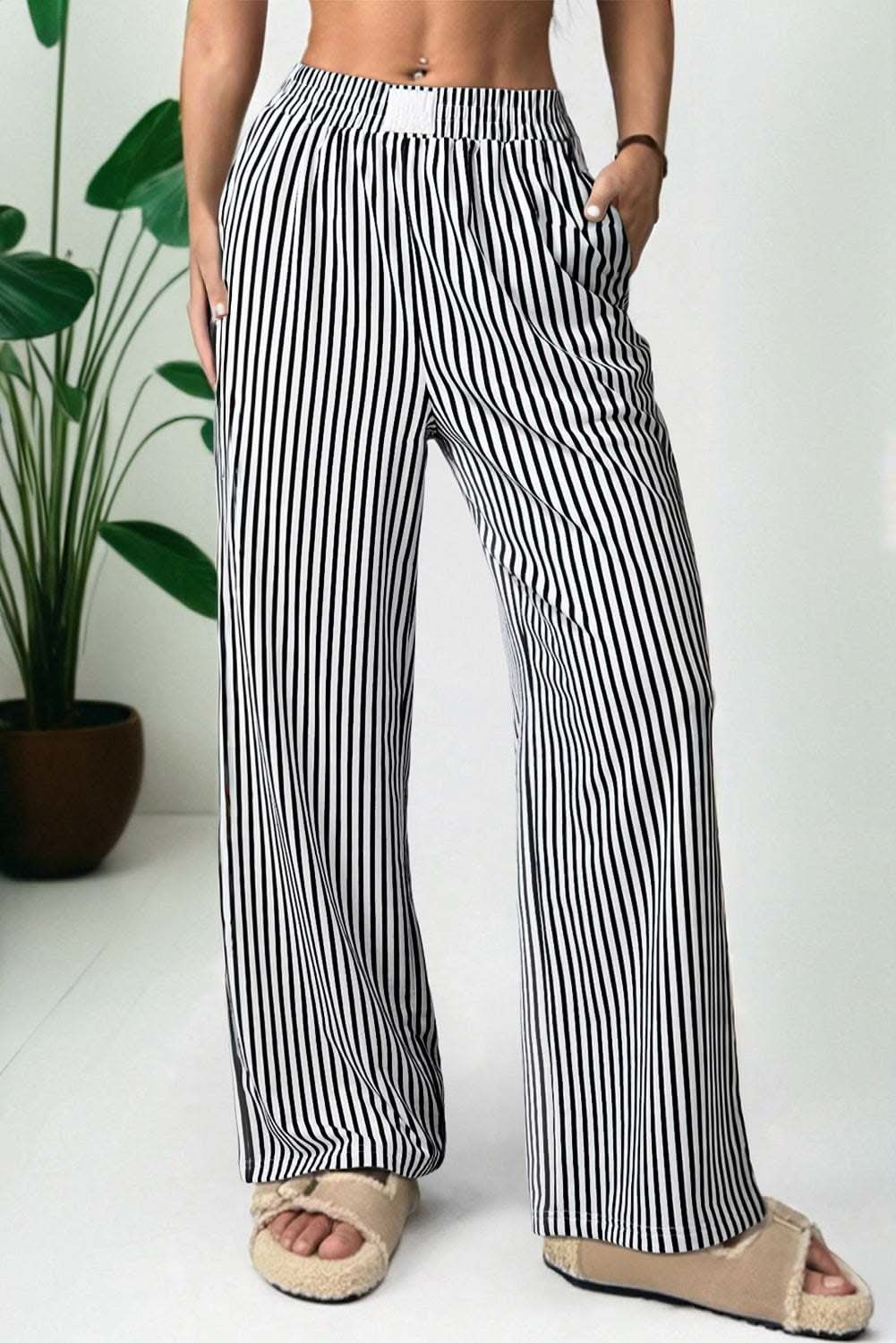 Black stripe elastic high waist loose pants with side pockets and flowy fit