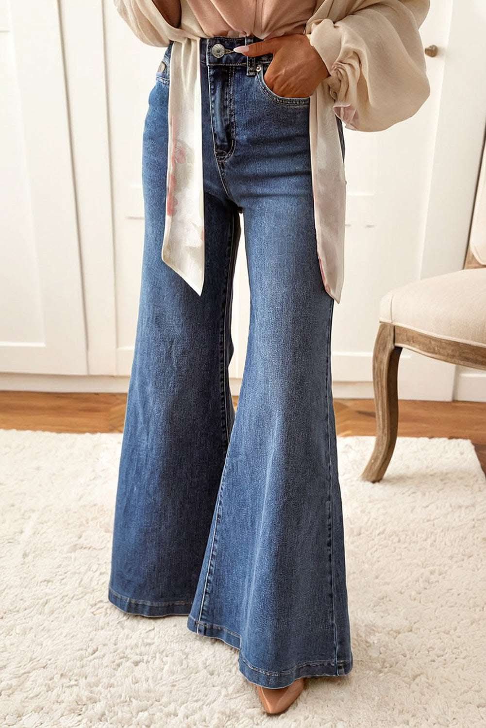 dirty blue high waist button zip fly bell bottom jeans with stretchy denim and retro silhouette