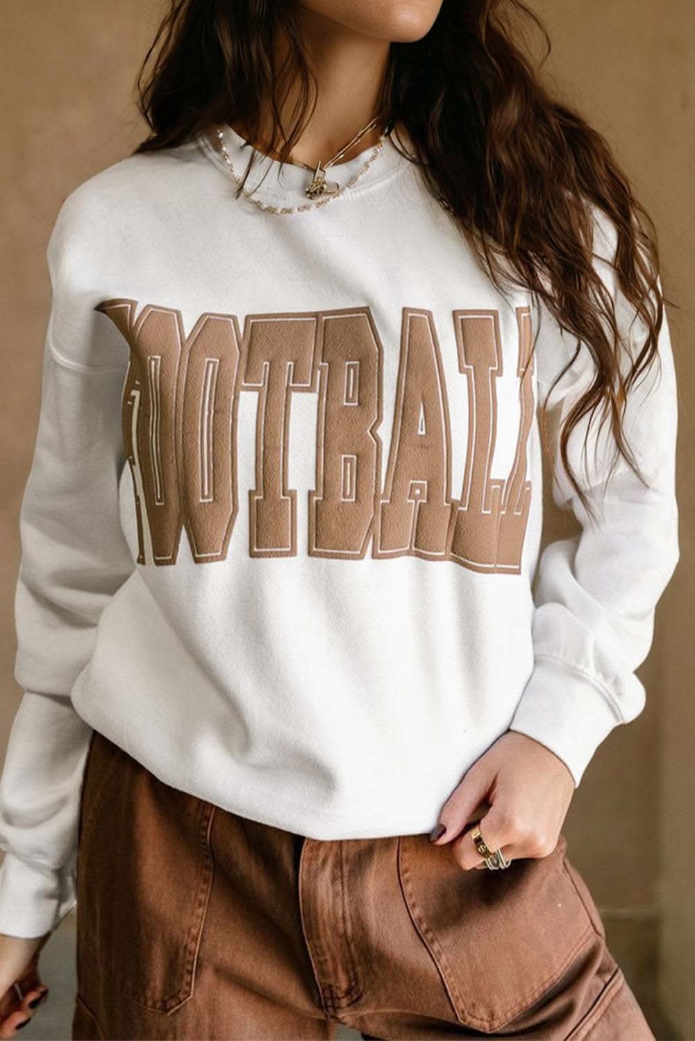 White crew neck sweatshirt with 3D FOOTBALL letter graphic and relaxed fit