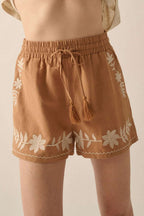 Khaki embroidered boho shorts with tasseled drawstring elastic waistband and floral design