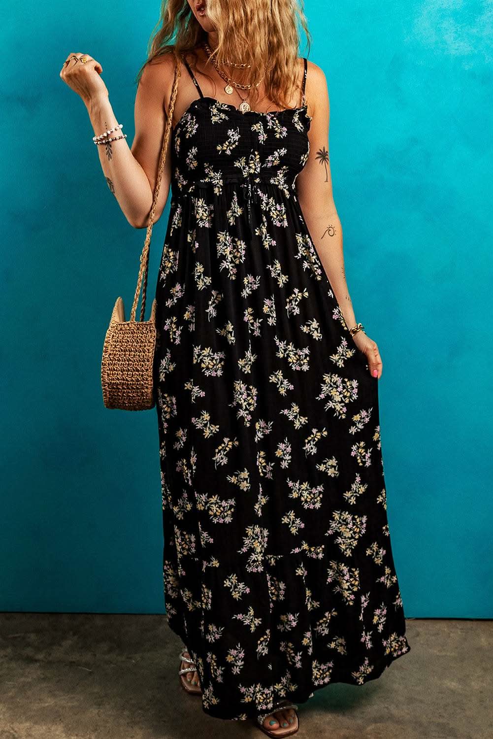 Black floral spaghetti strap maxi dress with shirred bodice and tied empire waist