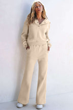Woman wearing parchment solid color hoodie and high waist pants two piece activewear set