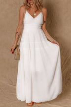 White spaghetti straps high waist long elegant maxi dress with smocked bodice and v-neck.